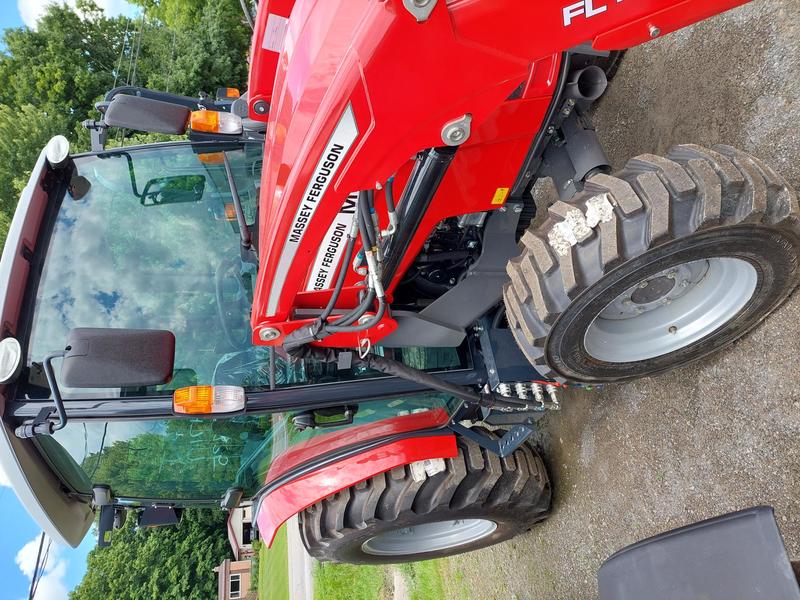 Tractors  Massey Ferguson MF1835M Tractor with Cab and Loader Photo